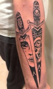 Long illustrative blade tattoo design