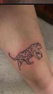 Small illustrative cheetah tattoo by Lana