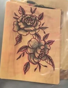 Layered floral tattoo design